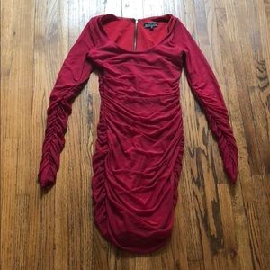 Boulee form sitting sleek red dress!